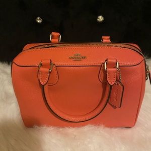 Coral coach purse